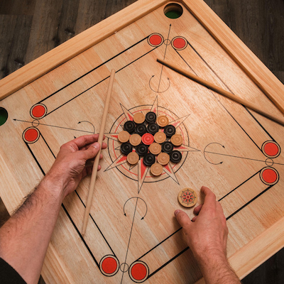 A Game Of Carrom to Help You Bond With Family And Friends
